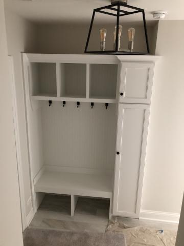 Rear hall boot bench with cubbies and cabinet