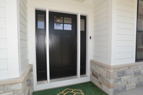 Craftsman style entry door with matching sidelights