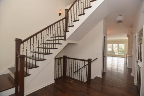 Custom stair with iron balusters