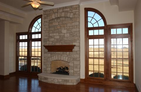 Custom stone fireplace and window surround