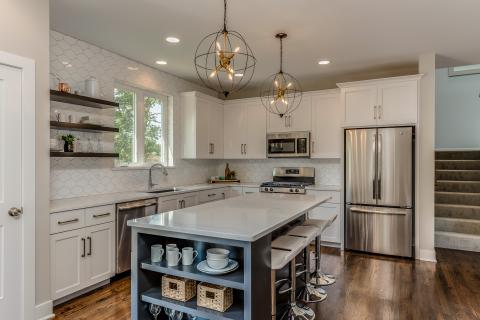 Chestnut Hill - Lexington cabinet door with floating shelves and bookcase on island