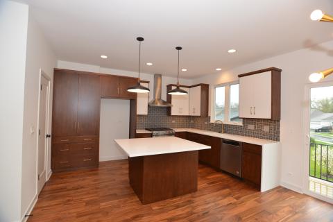 McAlister - Yorktown cabinets with painted uppers and walnut 