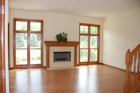 Fireplace with flanking windows